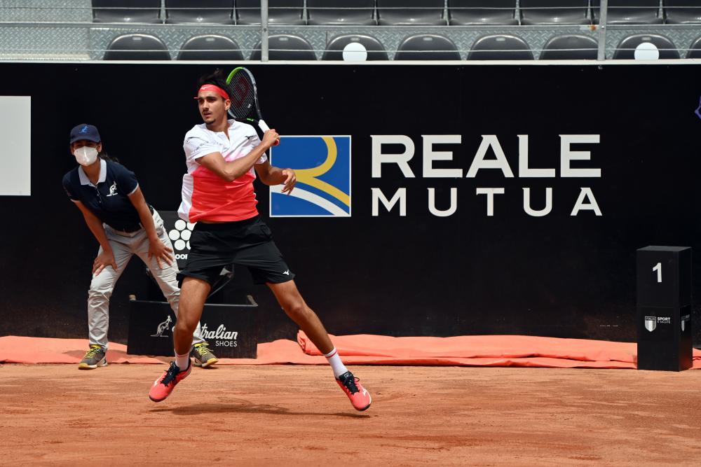 Monfils Sonego stretta di mano