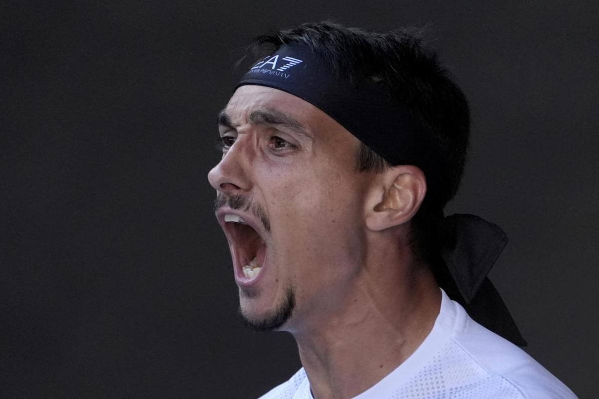 Lorenzo Sonego esulta a Melbourne