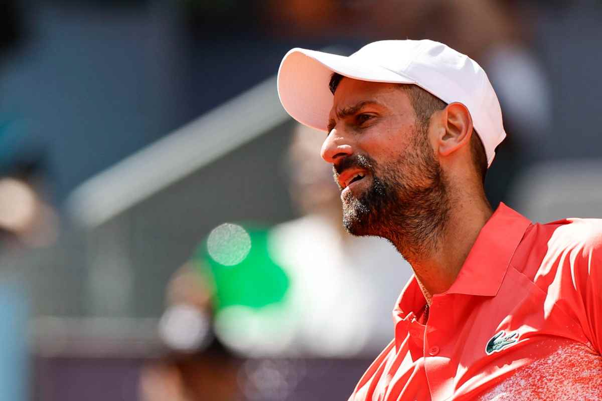 Smorfia di Novak Djokovic durante un match