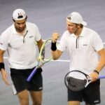 Fratelli Berrettini impegnati a giocare un match di doppio