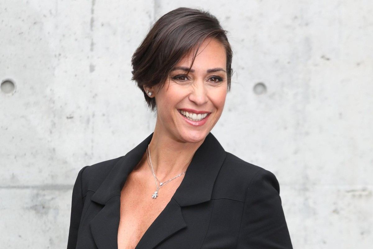 Flavia Pennetta sorridente in abito elegante