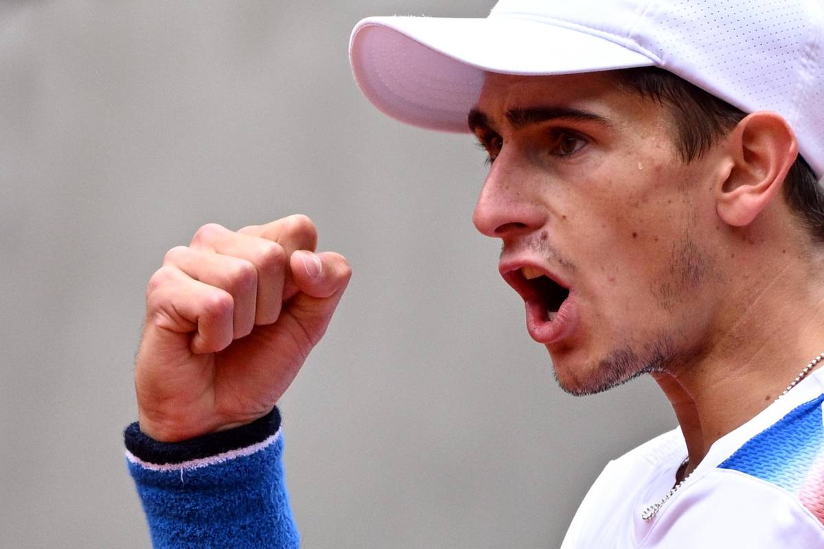 Primo piano di Arnaldi che esulta dopo aver vinto un punto