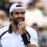 Berrettini che si tocca la bocca